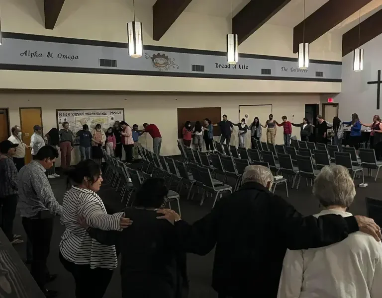 La Viña members gathered together after a service