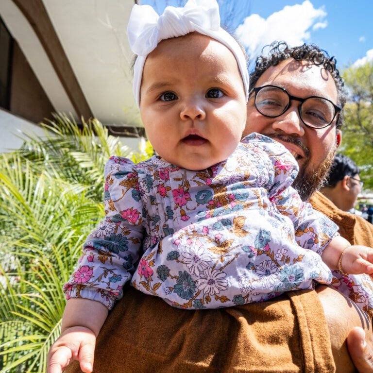 A baby being held at La Viña Covenant Church